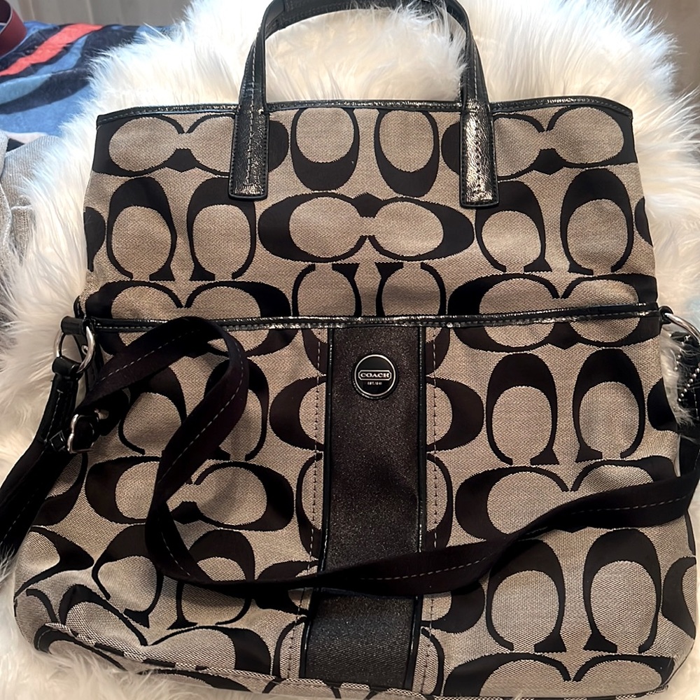 Coach black signature fold over tote bag.